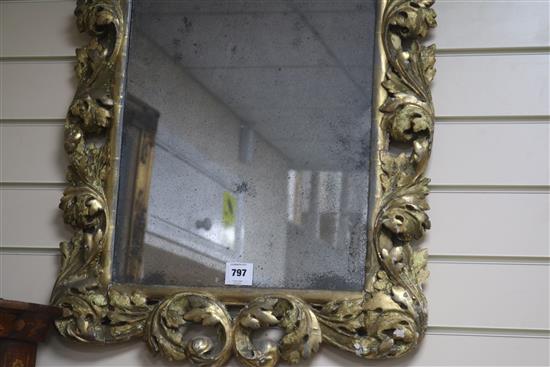 A late 17th century Italian carved giltwood frame wall mirror, W.1ft 10in. H.2ft 4in.